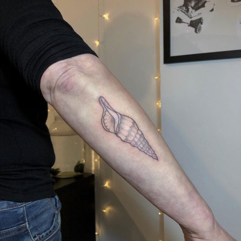 Tetování znaky a symboly, symbol moře na předloktí