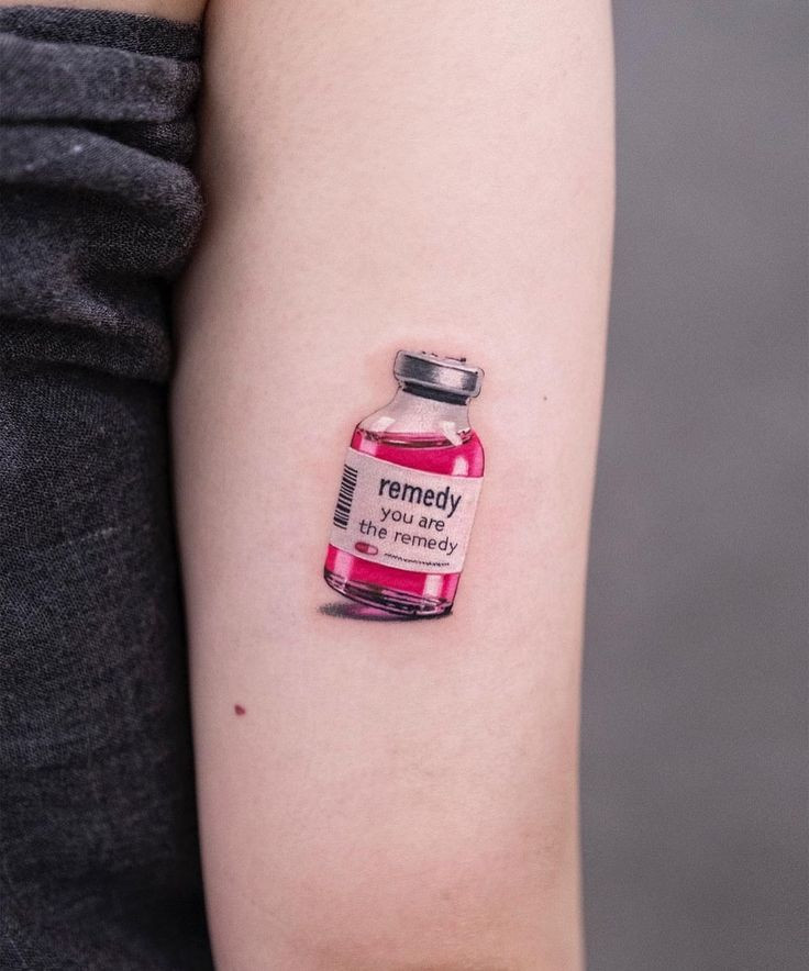 Lahvička s lékem jako tetování.