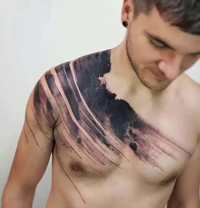 Tetování abstraktní čáry na hrudníku