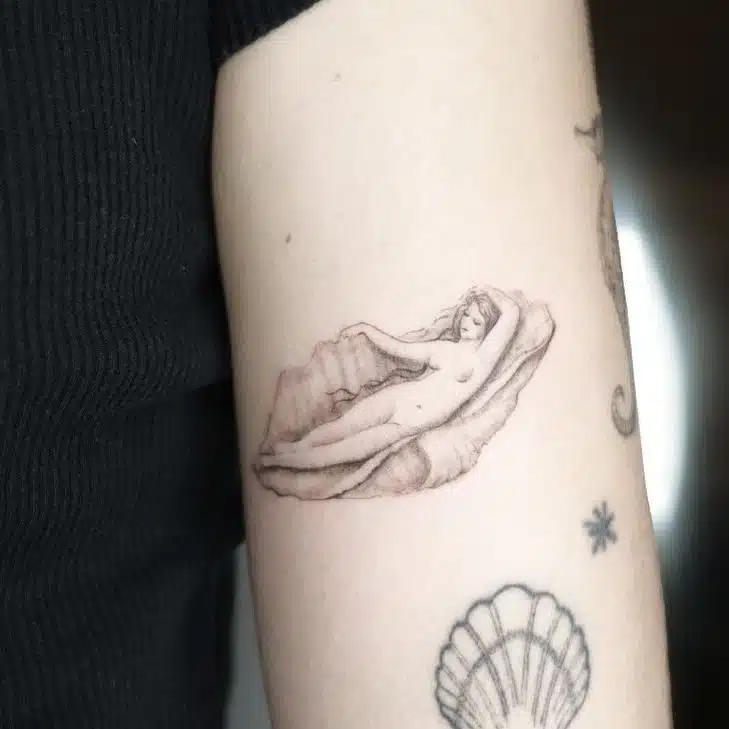 Tetování symbolika ženy na paži