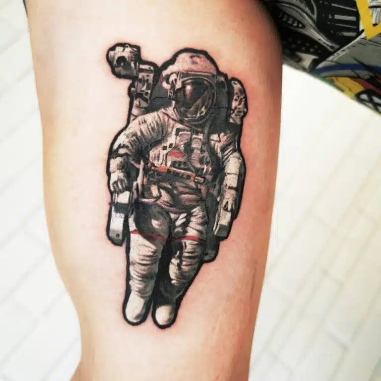 Tetování vesmír, astronaut na paži