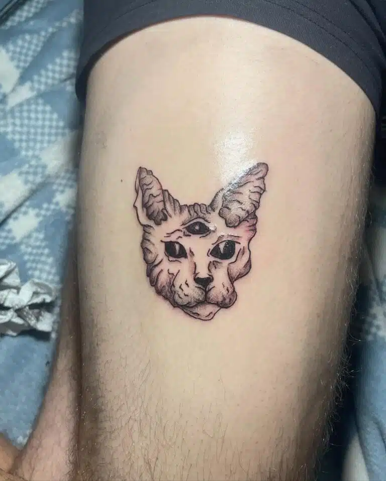 Tetování zvíře na stehno
