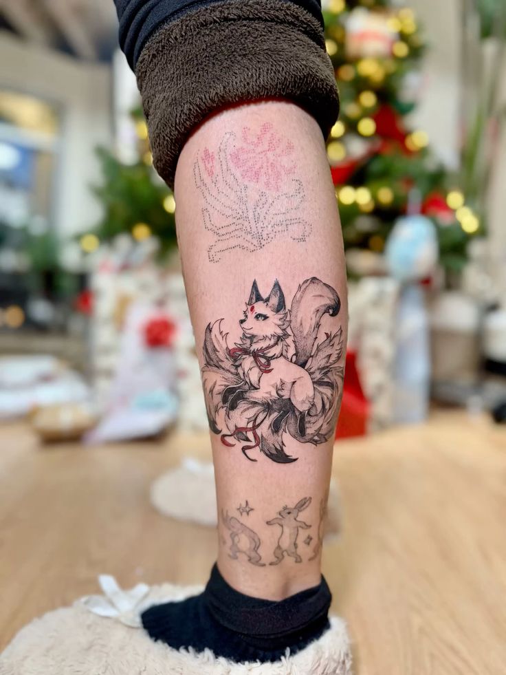Tetování tradiční japonské lišky kitsune.