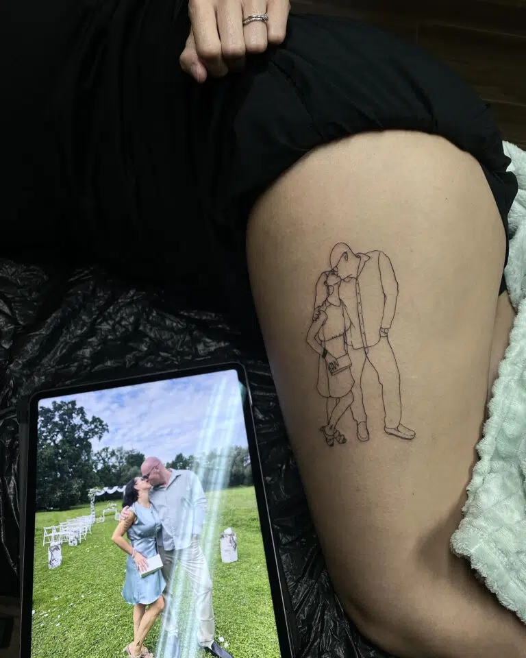 Tetování muž a žena na stehně